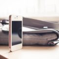 white-iphone-4s-standing-on-the-desk-picjumbo-com